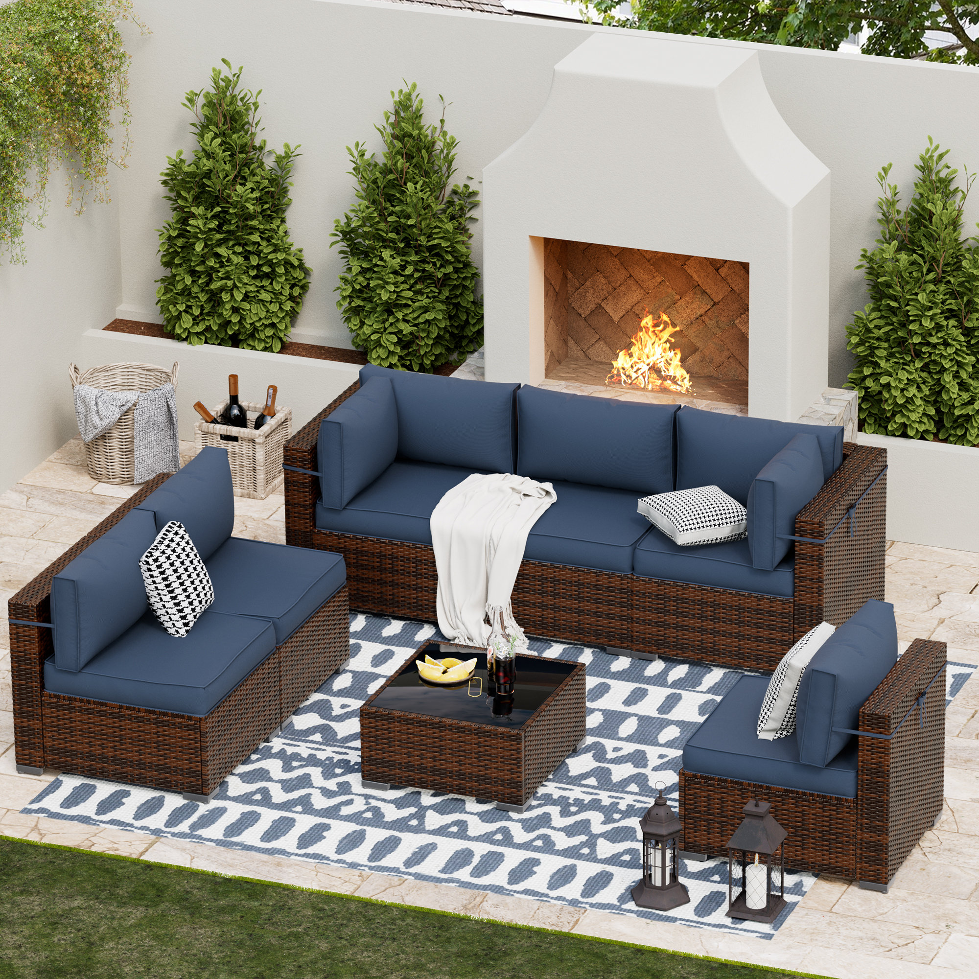 Bhairavi 7 Piece Rattan Sectional Seating Group with Cushions