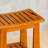 14.1-Inch Compact Teak Shower Stool With Shelf And Armrests. Waterproof And Non-Slip. Suitable For Small Bathrooms And Outdoor Use. Weight Capacity: 300 Lbs.