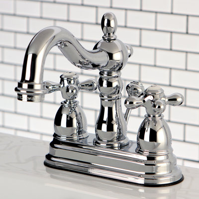 Kingston Brass Heritage Two-Handle 3-Hole Deck Mount 4" Centerset Bathroom Faucet with Brass Pop-Up
