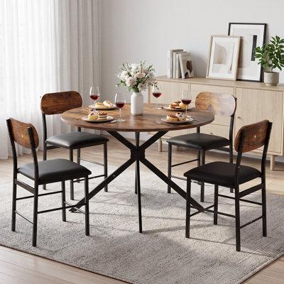 Ensemble de table et de chaises rondes de 5 pièces pour 4 personnes, de style moderne du milieu du siècle, avec des sièges en similicuir, idéal pour les petits espaces.