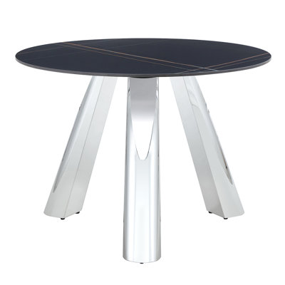 Une table ronde en acier inoxydable à motif de pierre brûlante de 42 pouces avec pieds convenant à 2, 4 ou 6 personnes