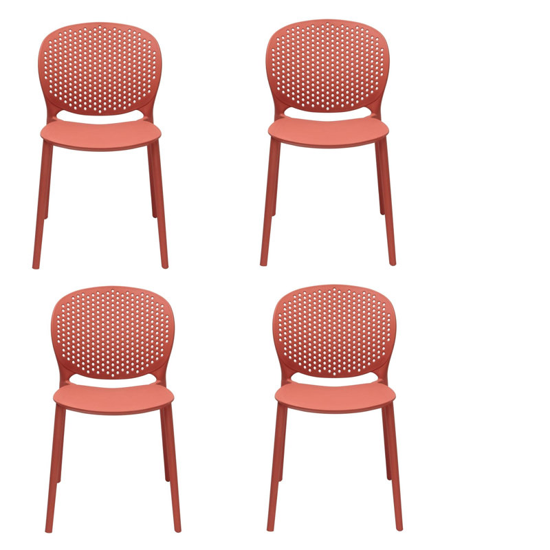 Ensemble de quatre chaises d'appoint en plastique orange