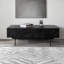 Table basse noire sculptée-110476767