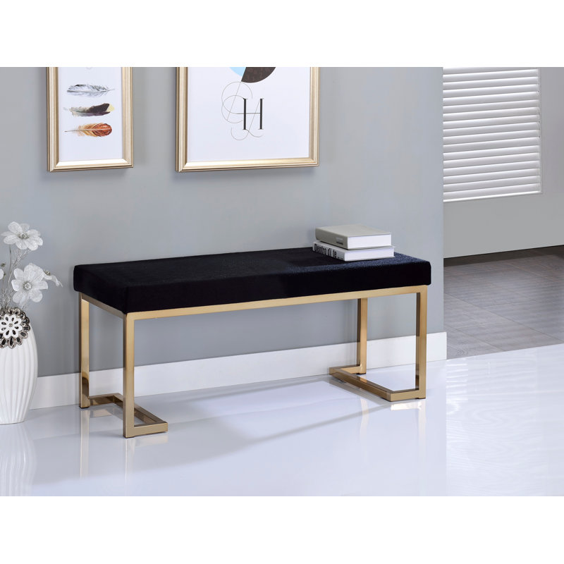 Banc en tissu noir et finition champagne