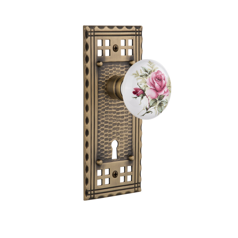 Craftsman Plate with Decorative Keyhole and White Rose Porcelain Door Knob, Antique Brass