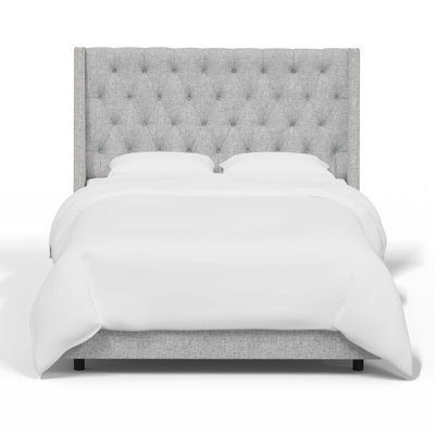 Avala Upholstered Wingback Bed