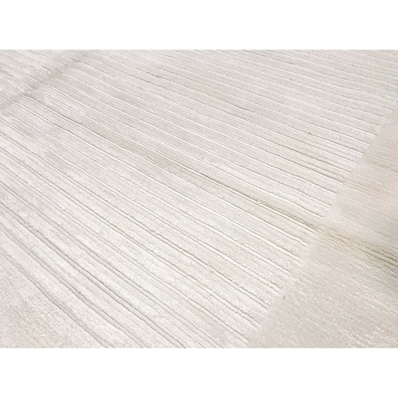 Tapis ivoire noué à la main de haute qualité
