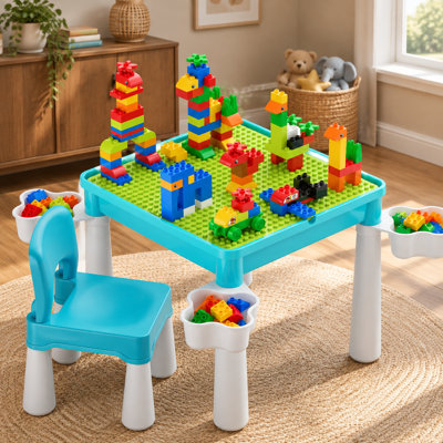 This blue toddler building table set comes with 1 chair, 128 building blocks and a storage box; its sturdy ABS construction, smooth edges and leakproof sand-and-water top suit indoor or outdoor play for ages 3+ and gifting.