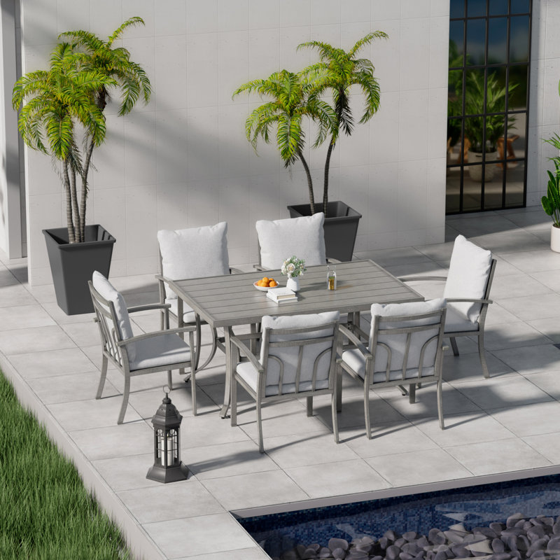 Germien 6 - Person Patio Dining Set with Rectangular Table , Cushions Included