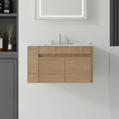 Meuble-lavabo flottant avec portes à fermeture douce et comptoir en marbre de culture