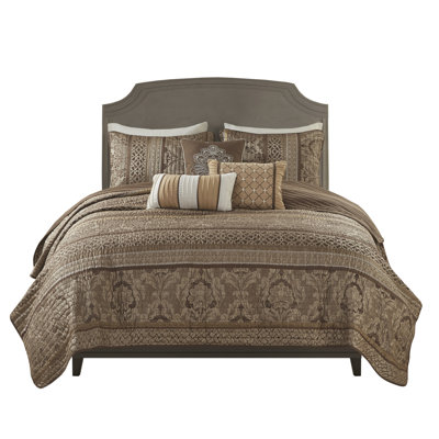 King/ King Quilt - Brown/Gold. Made From . Leaf, Striping & Motifs. Includes 3 Throw Pillows. Convenient Machine Washable With Ease Pillows Brown And Gold. Fabric. Reversible For Different Decor