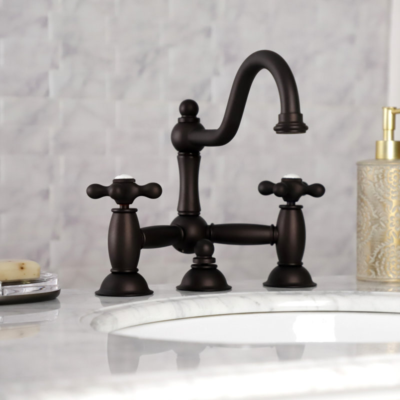 Kingston Brass Restoration Two-Handle 3-Hole Deck Mount Bridge Bathroom Faucet with Brass Pop-Up, Oil Rubbed Bronze