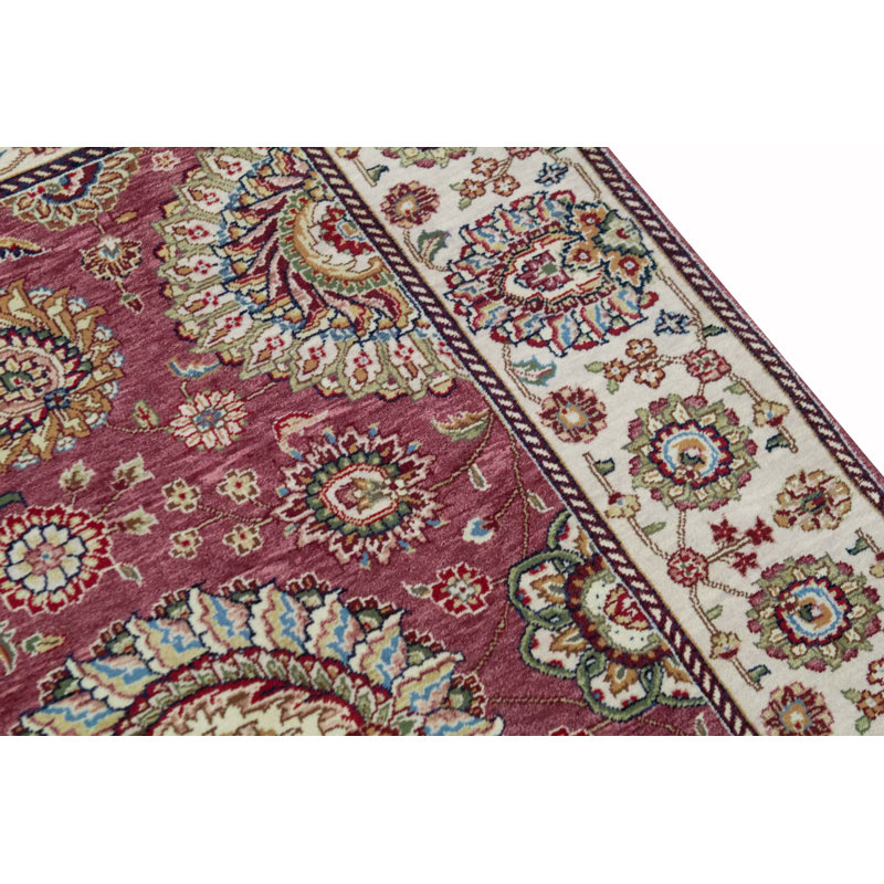 Tapis rose et ivoire de haute qualité noué à la main