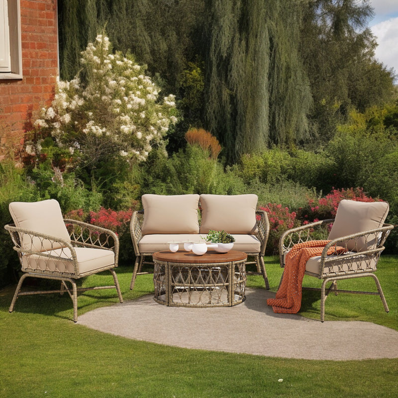 Noralf Acacia Wicker 4 - Person Patio Conversation Set with Cushions