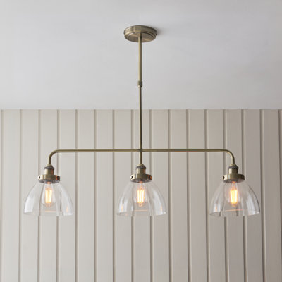 Anais 3lt Linear Pendant light finished in Ant. Brass