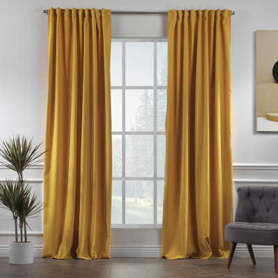 Paire de rideaux obscurcissant avec pattes de couleur unie