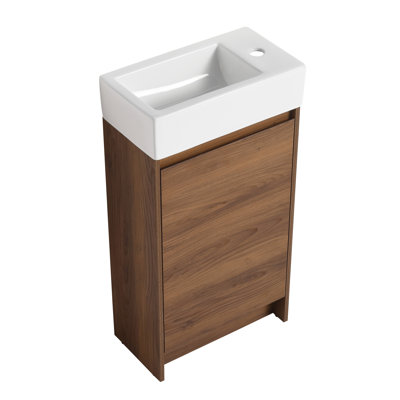 Meuble-lavabo élégant avec lavabo simple et portes à fermeture douce, parfait pour les petites salles de bain
