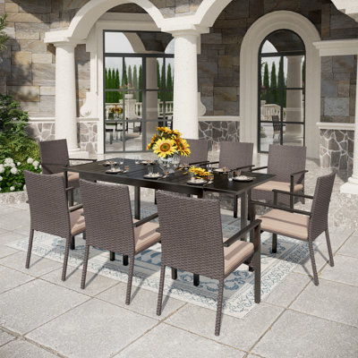 Ensemble de salle à manger de patio extensible 9 pièces avec fauteuils en rotin Argyri