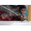 Papier peint Dark Samurai Warrior Girl - intense murale d'inspiration animée avec une expression féroce, scène de guerre asiatique dynamique, parfaite pour la chambre à coucher ou la salle de jeux