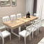 Table de salle à manger extensible pour 6 à 10 personnes, avec une base longue en bois à haute température, une surface et des lignes transparentes