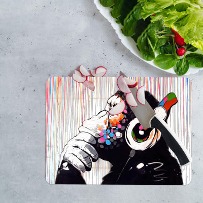 Élégante planche à découper en verre avec un motif de graffiti de singe réfléchi pour un accent décoratif unique dans votre maison ou votre bureau moderne