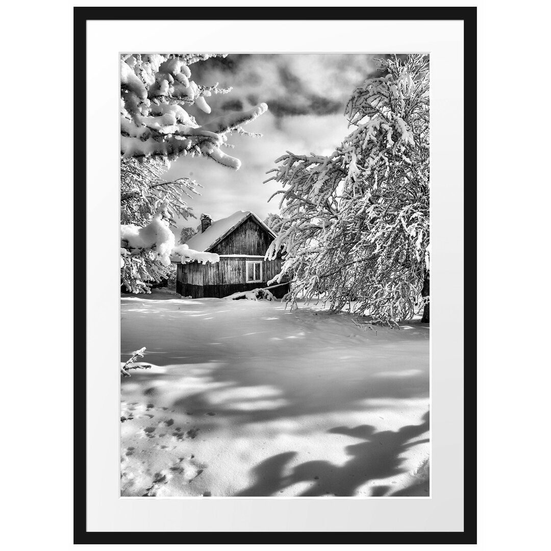 Gerahmtes Poster Winterlandschaft mit Hütte