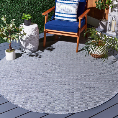 Tapis intérieur / extérieur bleu marine / ivoire Lugo 230