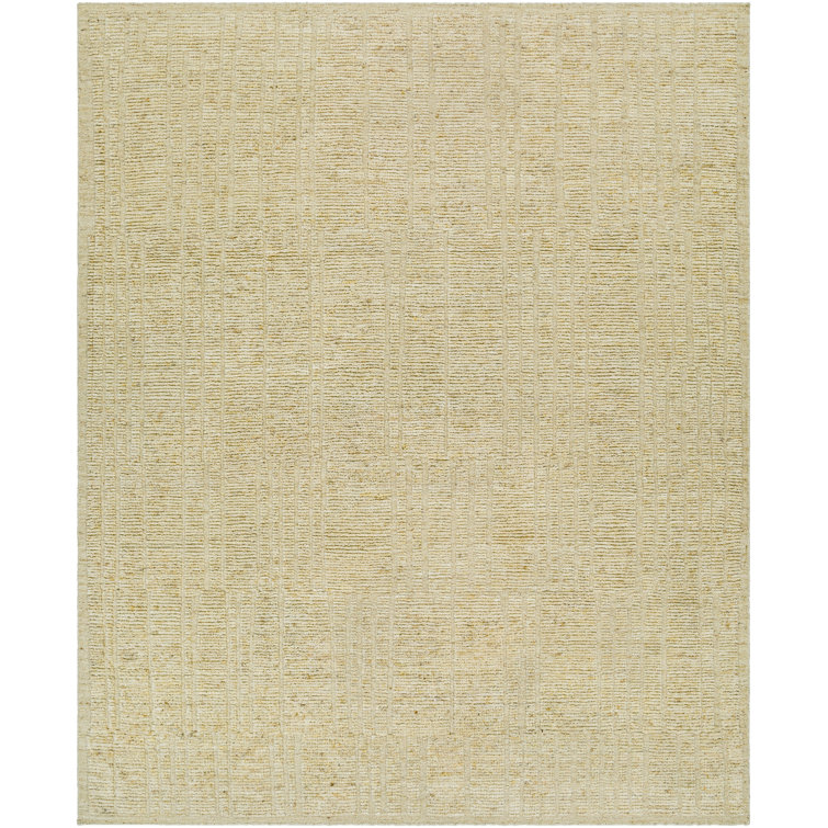 Gitte Solid Color Handmade Wool Area Rug in Beige