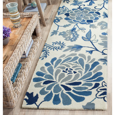 Tapis azurite / crème / noir en laine / coton touffeté à la main à motif floral Coreatha