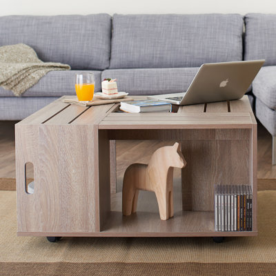 Table basse sur roulettes avec rangement Henjes