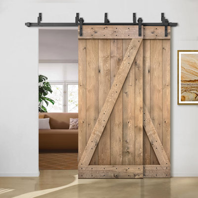 Porte de grange à panneaux et en bois avec quincaillerie d'installation