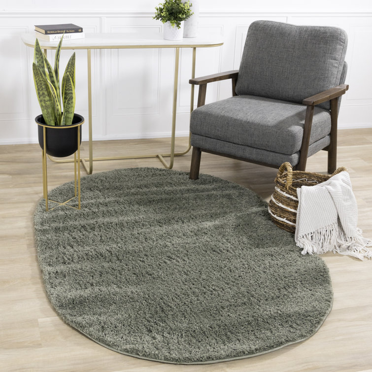 Melnik Solid Colour Machine Woven Polypropylene Area Rug in Sage Green