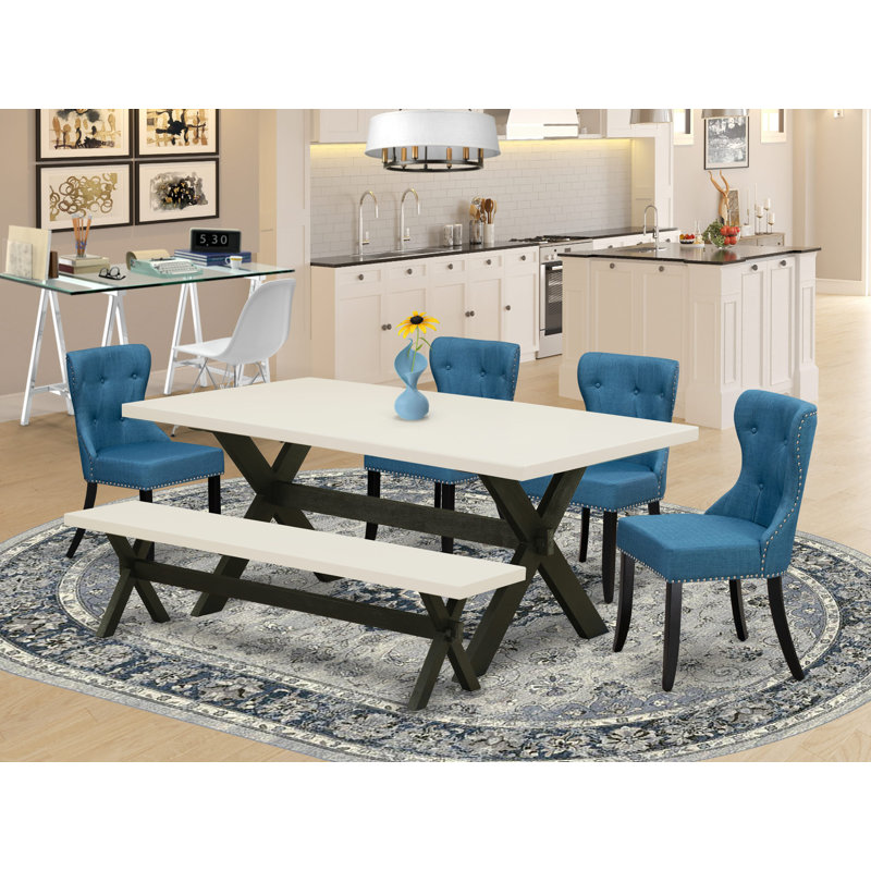 L'ensemble de table de cuisine 6 pièces contient une table de salle à manger rectangulaire avec des pieds en X et 4 chaises Parson en tissu de lin avec banc, noir brossé