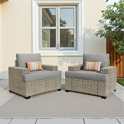 Chaises de patio en osier d'extérieur en rotin avec coussins et accoudoirs larges