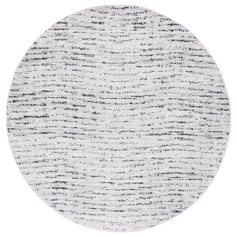 Riebe Abstract Ivory/Silver Area Rug