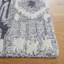 Tapis noir / ivoire en laine / coton touffeté à la main Ikat-1045644050