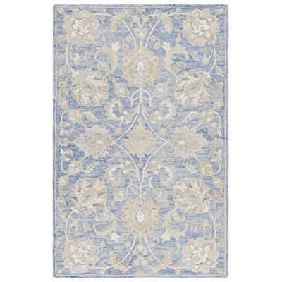 Tapis ivoire / bleu en laine touffeté à la main Esponga
