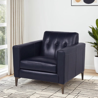 Fauteuil club capitonné Dannie