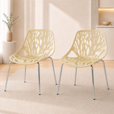 Chaises d'appoint empilables avec dossier à découpes florales et pieds en acier inoxydable - sièges de cuisine, de restaurant ou de banquet modernes