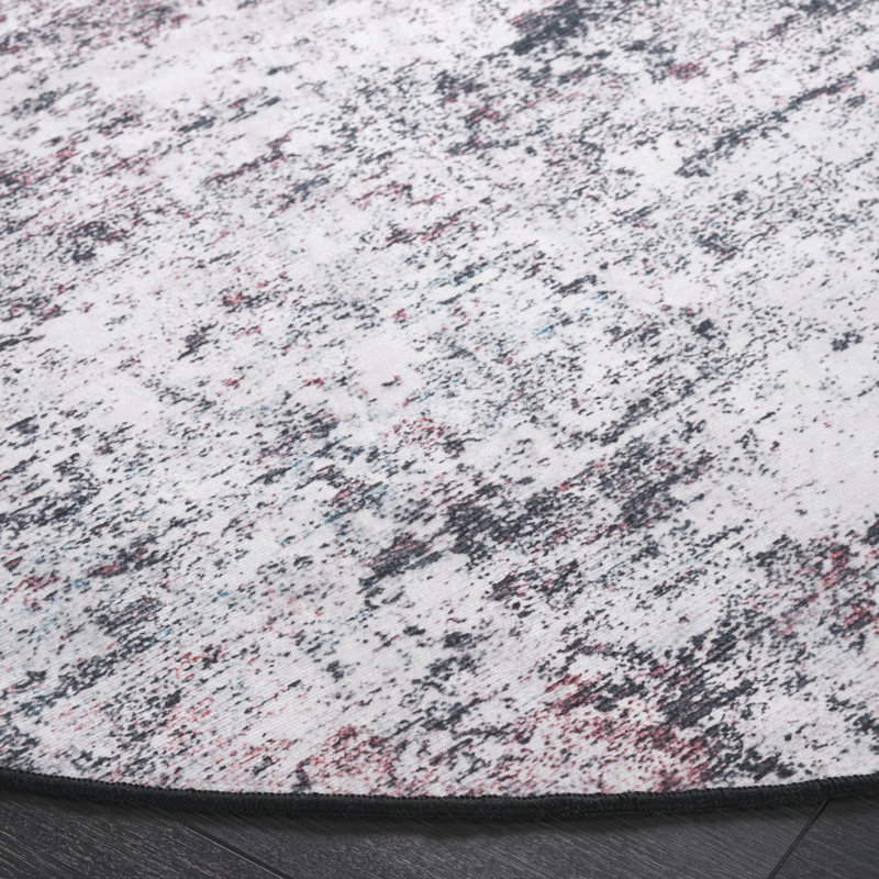 Tapis Malibu 943 en prune / noir, Rond 6 pi