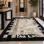 Tapis en cuir de vache fabriqué à la main en patchwork, tapis noir et blanc ivoire-914750099