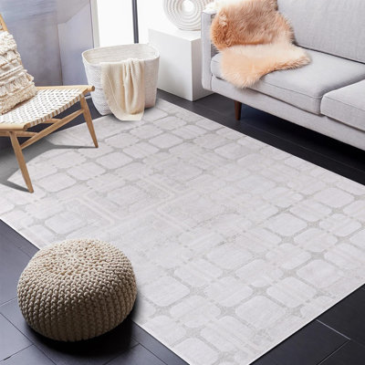 Tapis géométrique abstrait argenté / beige de la collection Hypnos