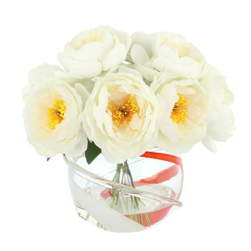 Pivoine disposée dans un vase en verre