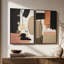Ensemble de 2 peintures murales abstraites encadrées et texturées, empasto, dans des tons de noir beige et de terre cuite