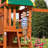 Backyard Discovery Oakmont Cedar Wood Swing Set with Wave Slide, Clubhouse, Playhouse, and Snack Bar Window