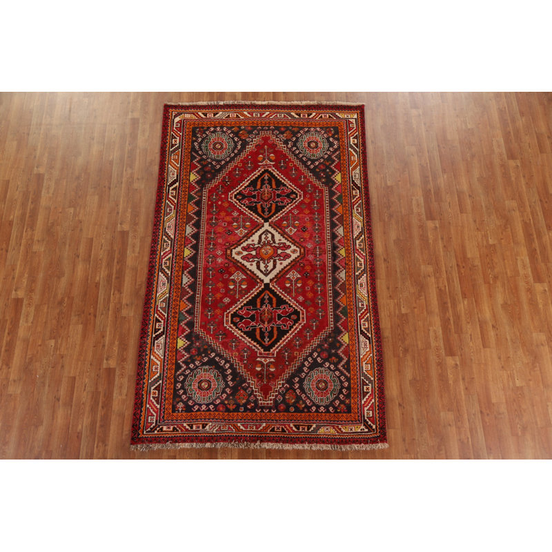 Tapis persan Shiraz à motif végétal teint 5 x 9