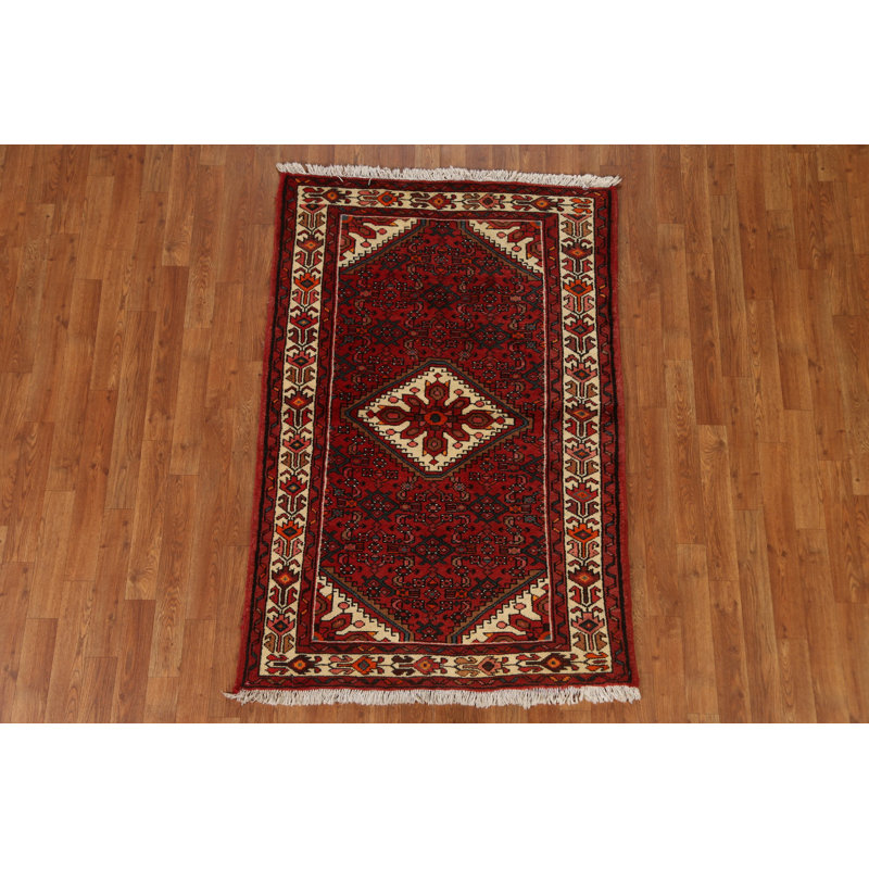 Tapis rouge à motif géométrique 3x5