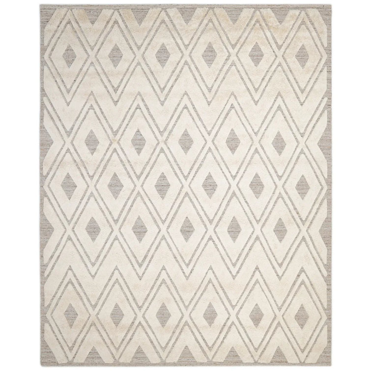 Carrabotta Geometric Handmade Area Rug in Beige