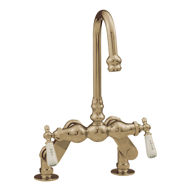 Deck Mount Tub Faucet with Porcelain Lever Handles by Strom Living, Unlacquered Raw Brass