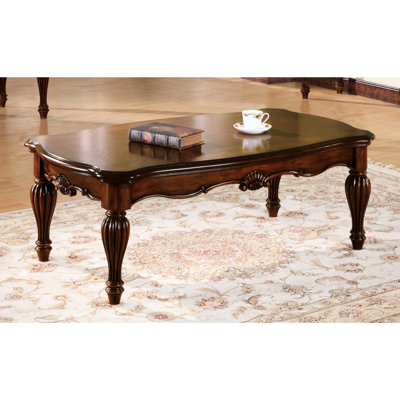Cherry Wood Rectangle Coffee Table With Eye-catching Turned Legs Rich Hue Stylish Leg Ornamentation